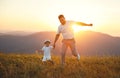 Father`s day. Happy family father and toddler son playing and la Royalty Free Stock Photo