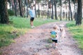 Father`s day. Happy family father and toddler son playing and laughing on nature Royalty Free Stock Photo