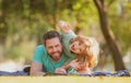 Father's day. Happy family son hugs his dad on summer holiday. Royalty Free Stock Photo