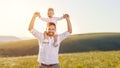 Father`s day. Happy family father and toddler son playing and l Royalty Free Stock Photo