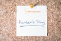 Father's Day Reminder For Tomorrow On Paper Pinned On Cork Board