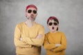 Father`s day,father and son with sunglasses and Cap