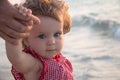 Father`s hand lead his child girl in summer beach nature outdoor, trust and together love family concept. Caucasian dad and littl