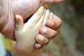 Father's and his son hand in hand. Family concept Royalty Free Stock Photo