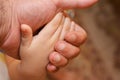 Father's and his son hand in hand. Family concept Royalty Free Stock Photo