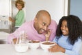 Father Sitting With Daughter At Breakfast Royalty Free Stock Photo