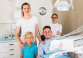 Father is sitting in dental chair Royalty Free Stock Photo