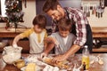 Father, smile and children baking, learning and happy boys bonding together in home. Dad, kids and cooking with flour Royalty Free Stock Photo