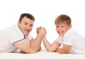 Father and son in arm-wrestling competition