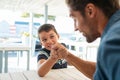 Father and son in arm wrestling competition Royalty Free Stock Photo