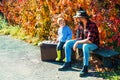 Father and son in autumn park having fun and laughing. Royalty Free Stock Photo