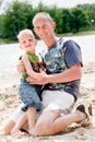 Father and son on the beach Royalty Free Stock Photo