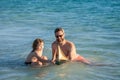 father and son beachside bonding. playing together dad and son. happy moments with father and son. Father son beach Royalty Free Stock Photo