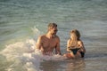 father and son beachside bonding. playing together dad and son. happy moments with father and son. Father son beach Royalty Free Stock Photo