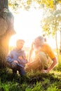 Father-Son Bond: Exploring Nature's Wonders at Sunset Royalty Free Stock Photo