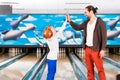 Father and son in bowling center Royalty Free Stock Photo