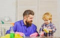 Father and son cleaning. Dad and child doing clean at home. Royalty Free Stock Photo