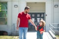 Father and son with father after come back from school. School, family education. Royalty Free Stock Photo