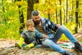 Father and son concept. Parent teach baby. Happy Father and son with spending time outdoor in the autumn park. Kid and