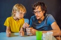 Father and son conduct chemical experiments at home. Home made slime