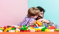 Father and son create constructions. Bearded man and son play together. Surefire ways to bond with your son. Father son Royalty Free Stock Photo