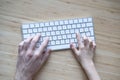 Father and son or daughter using the computer keyboard together Royalty Free Stock Photo