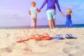 Father with son and daughter walking at beach Royalty Free Stock Photo
