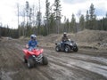 Father and son dirt biking blur Royalty Free Stock Photo