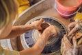 Father and son doing ceramic pot in pottery workshop Royalty Free Stock Photo