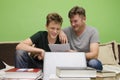 Father and son doing homework together Royalty Free Stock Photo