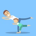 Father and son doing yoga exercise. Healthy