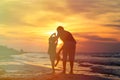 Father and son doing yoga at sunset sea Royalty Free Stock Photo