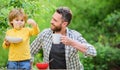 Father son eat food and have fun. Little boy and dad eating. Nutrition kids and adults. Healthy nutrition concept. Menu