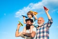 Father and son enjoying outdoor. Father and son playing outdoors. Happy men loving family. Happy grandfather father and Royalty Free Stock Photo