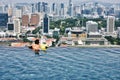 Father and son enjoying the view from marina bay sands singapore swimming pool Royalty Free Stock Photo