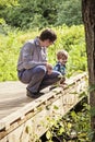 Father and son exploring nature