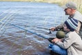 Father and son fishing at a lake Royalty Free Stock Photo