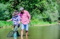 Father and son fishing. Nice catch. Rod and tackle. Fisherman fishing equipment. Fisherman grandpa and mature man Royalty Free Stock Photo