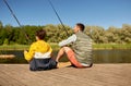 father and son fishing on river Royalty Free Stock Photo