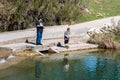 Father and Son Fishing in the River Royalty Free Stock Photo