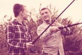 Father and son fishing on river Royalty Free Stock Photo