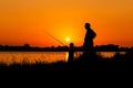 Father and son fishing in the river Royalty Free Stock Photo