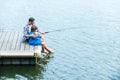 Father and son fishing.