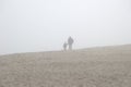 Father and son in the fog Royalty Free Stock Photo