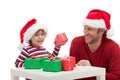 Father and son with gift boxes Royalty Free Stock Photo