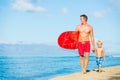 Father and Son Going Surfing Royalty Free Stock Photo