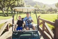 Father and son golfing together on a Summer day Royalty Free Stock Photo