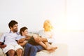 Father son and grandfather Sitting on Sofa