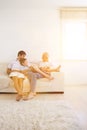 Father son and grandfather Sitting on Sofa