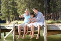 Father,son and grandson fishing together Royalty Free Stock Photo